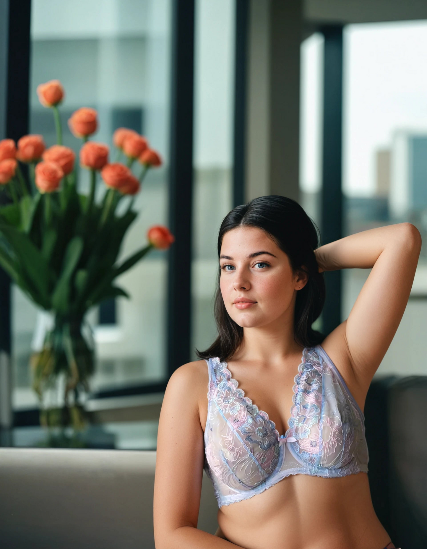 Handmade floral lace bra in pastel pink and blue embroidery with sheer cups, underwire support, and romantic European design, displayed on a light background.